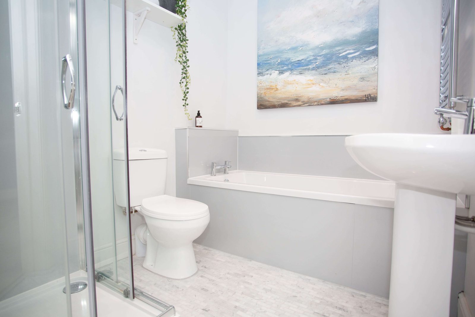 The Brancaster ensuite, with a walk-in shower cubicle and a separate bath